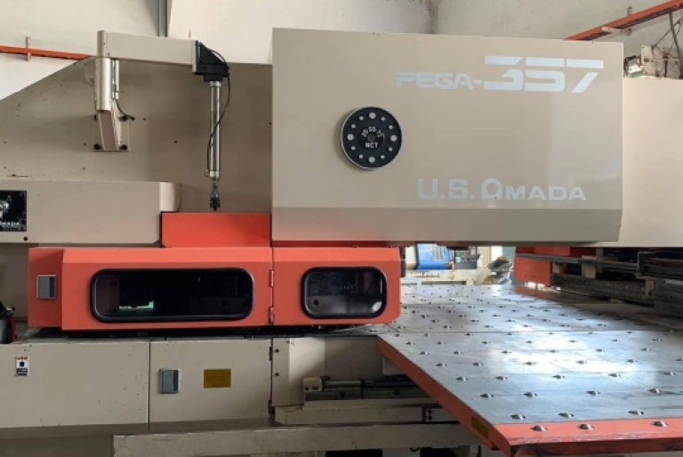 Nguyên lý hoạt động của máy đột dập CNC